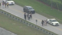 Florida students walk out of classes, embark on 10-mile walk to site of last week’s school shooting: Watch