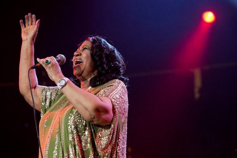 In this Saturday, May 11, 2013 photo, Aretha Franklin performs during McDonald's Gospelfest 2013 at the Prudential Center in Newark, N.J. Franklin has canceled performances in Chicago on May 20 and Connecticut on May 26 under a doctor's recommendation for treatment. It's unclear what she's being treated for. (Photo by Charles Sykes/Invision/AP, File)