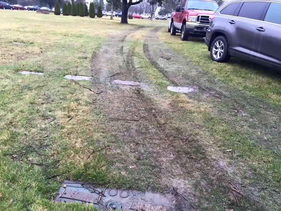 Supporters, protesters park on top of graves at Trump rally