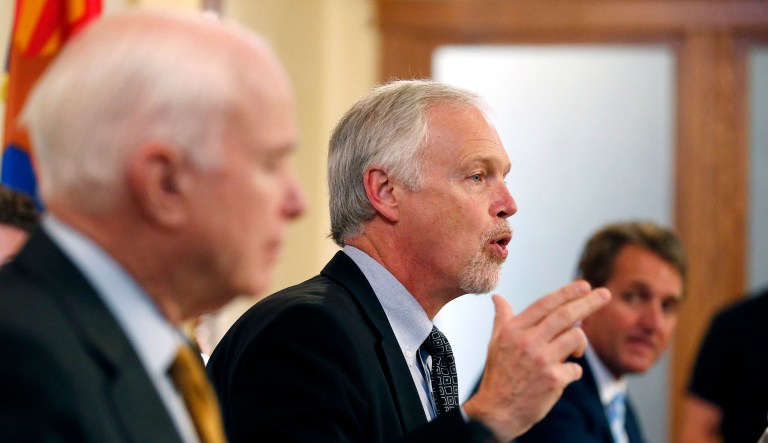 Repealing the Obamacare individual mandate as part of tax reform appeases conservative senators, but its other lawmakers -- like Sens. John McCain, R-Ariz.; Ron Johnson, R-Wis.; and Jeff Flake, R-Ariz. -- that need appeasing. (AP Photo/Ross D. Franklin)