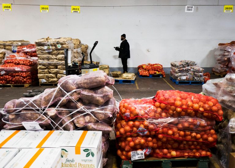 In this Thursday, Jan. 23, 2014, photo, vegetables are stacked in a  warehouse owned by Procacci Brothers, one of the nation's largest produce distributors, in Philadelphia. The Labor Department releases the Producer Price Index for January, on Wednesday, Feb. 19, 2014. (AP Photo/Matt Rourke)
