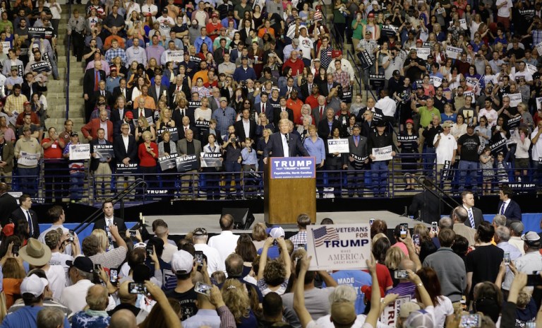 After debate, Donald Trump defending his campaign manager from allegations he assaulted a Breitbart writer. (AP Photo/Gerry Broome)