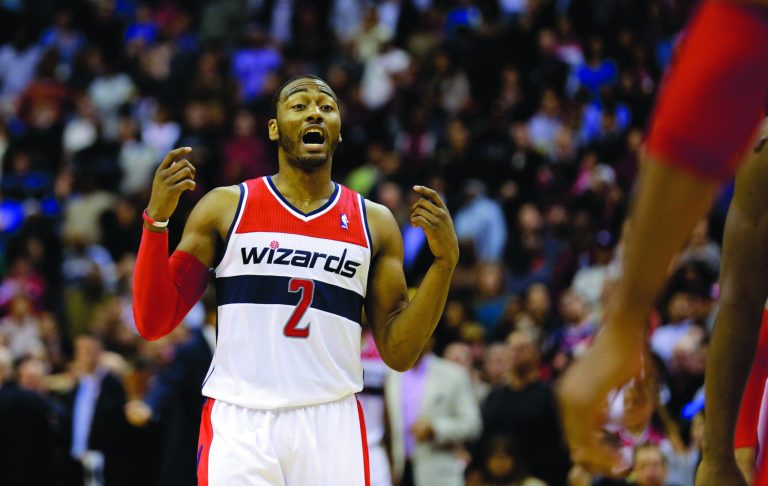 Alex Brandon/AP
Guard John Wall had 10 points, seven assists and one turnover in the Wizards' 90-84 win at Toronto on Monday.