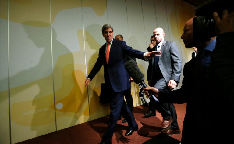 Secretary of State John Kerry leaves a press conference after finishing talks about Iran's nuclear program, in Geneva on Sunday. (AP Photo/Jason Reed, Pool)