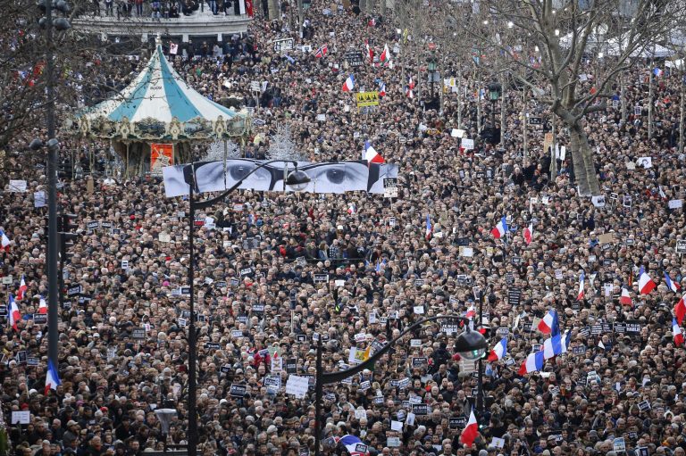 The crowd gathers during the march in Paris, France, Sunday, Jan. 11, 2015. Hundreds of thousands of people marched through Paris on Sunday in a massive show of unity and defiance in the face of terrorism that killed 17 people in France's bleakest moment in half a century. (AP Photo/Laurent Cipriani)