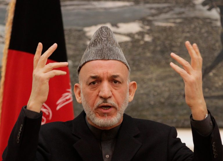  Afghan president Hamid Karzai gestures during a press conference at the presidential palace in Kabul Afghanistan, Saturday, Dec. 8, 2012. Karzai said Saturday that Thursday's assassination attempt on the country's intelligence chief was planned in neighboring Pakistan but he did not provide any evidence to back up his claim, and was careful not to accuse the Pakistani government of having any role in the suicide attack. (AP Photo/Ahmad Jamshid)  
