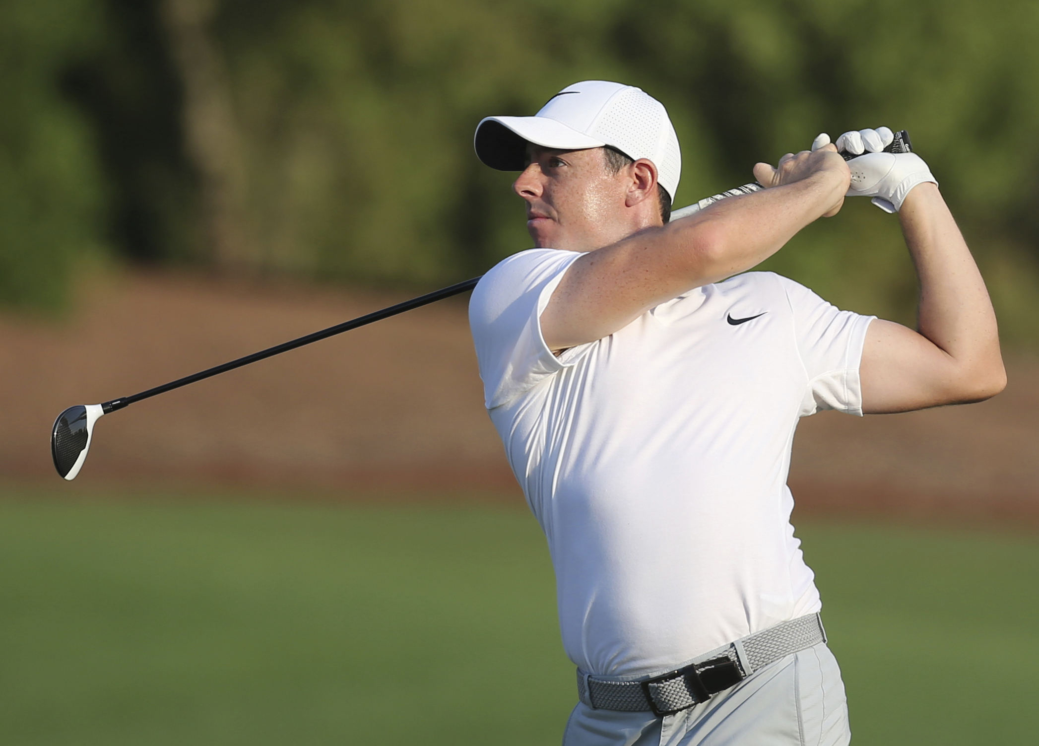 Rory McIlroy distances himself from Trump after golf round
