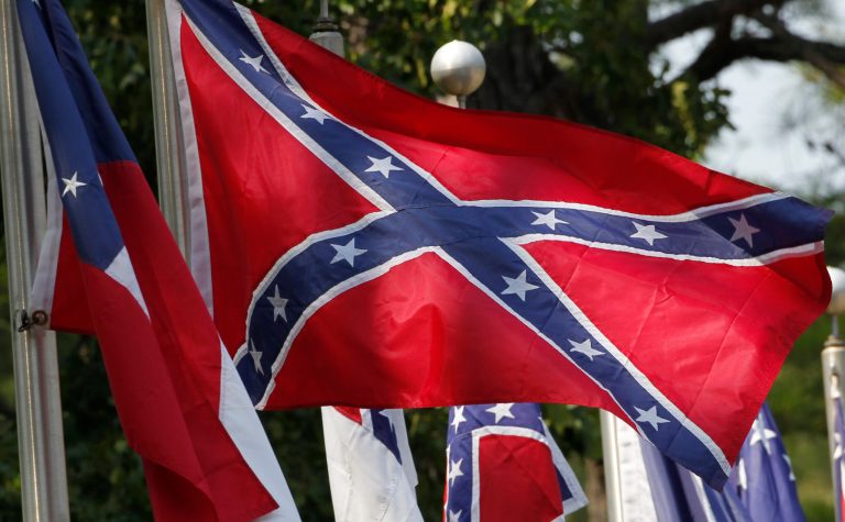 The Confederate flag once again flies outside Florida's Marion County government complex after commissioners voted unanimously to put it back up. (AP Photo)