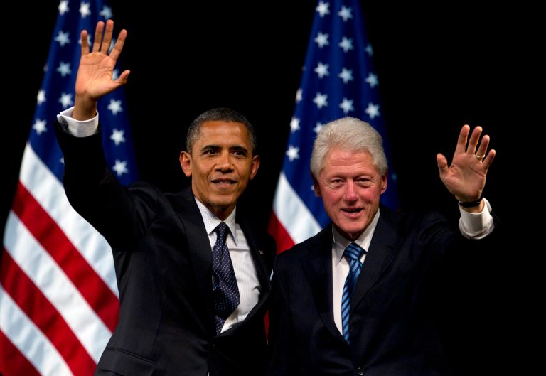   President Barack Obama and former President Bill Clinton wave to the crowd after speaking at a campaign event at the New Amsterdam Theatre, Monday, June 4, 2012, in New York. (AP Photo/Carolyn Kaster)  