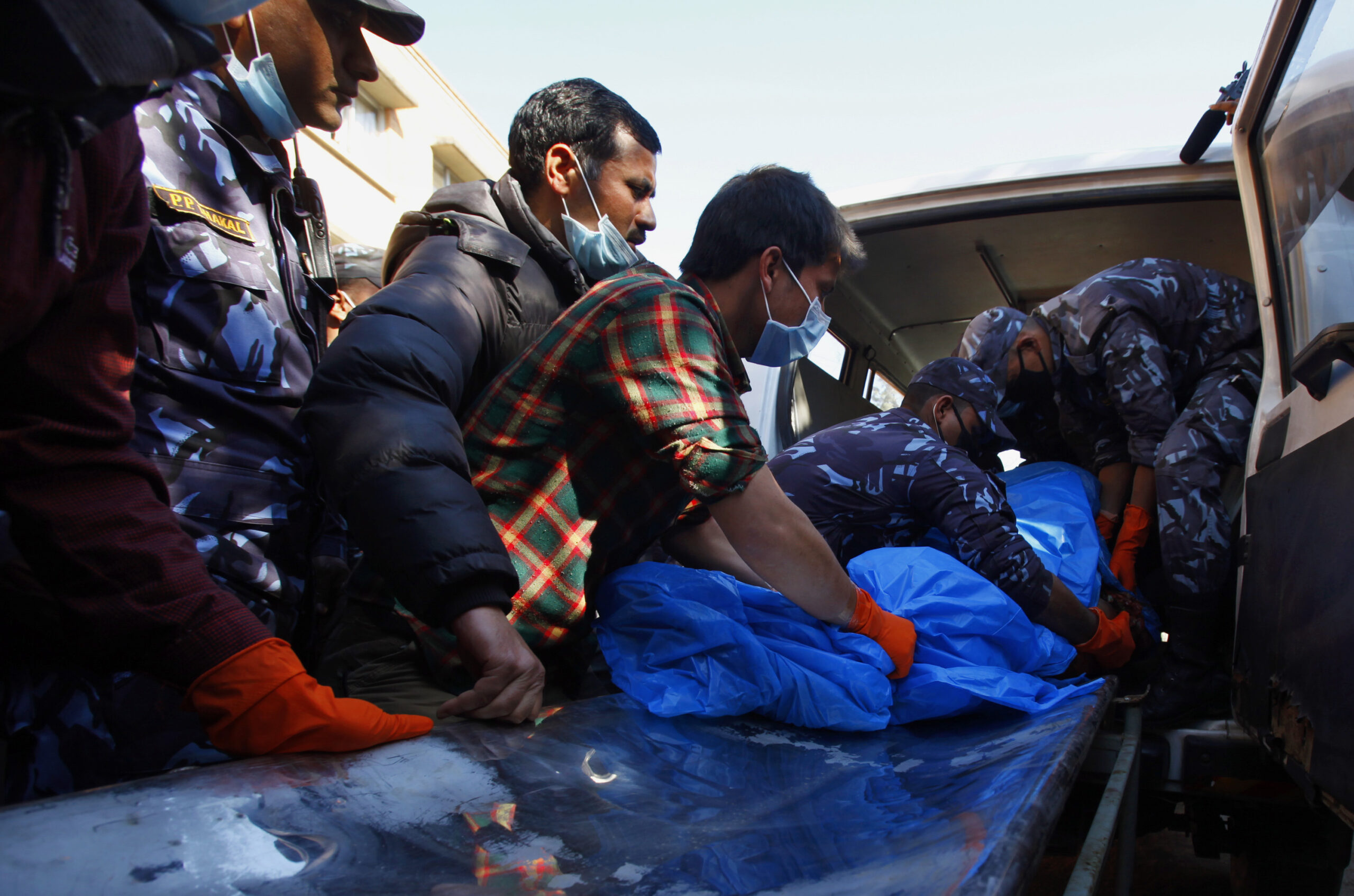 Nepal plane crash kills 18 in snow, rain and fog
