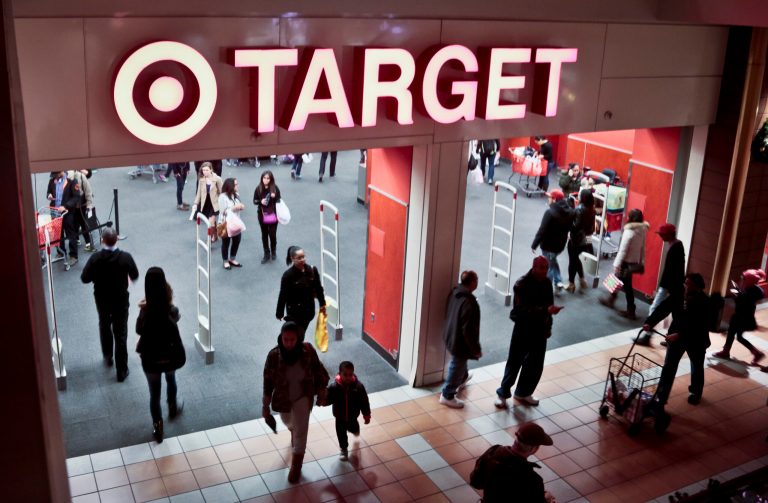 Shoppers visit Target on Saturday, in New York. Despite signs that the economy is improving. (AP/Bebeto Matthews)
