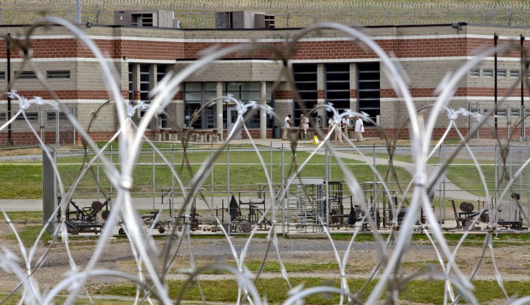New information from the Departments of Justice and Homeland Security show 42,034 people of the total 187,855 prisoners in federal prison are not U.S. citizens. (AP Photo/Steve Helber)