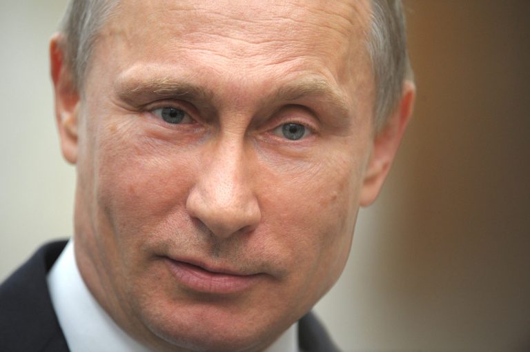 In this Tuesday, April 29, 2014 photo, Russian President Vladimir Putin speaks to press after a meeting of the  Eurasian Economic Council in Minsk, Belarus. (AP Photo/RIA-Novosti, Alexei Druzhinin, Presidential Press Service)