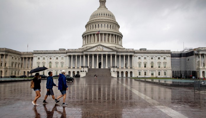 The governors -- four Republicans, five Democrats and one independent -- sent a letter to Senate leaders calling for them not to consider an overhaul bill. (AP Photo/J. Scott Applewhite)
