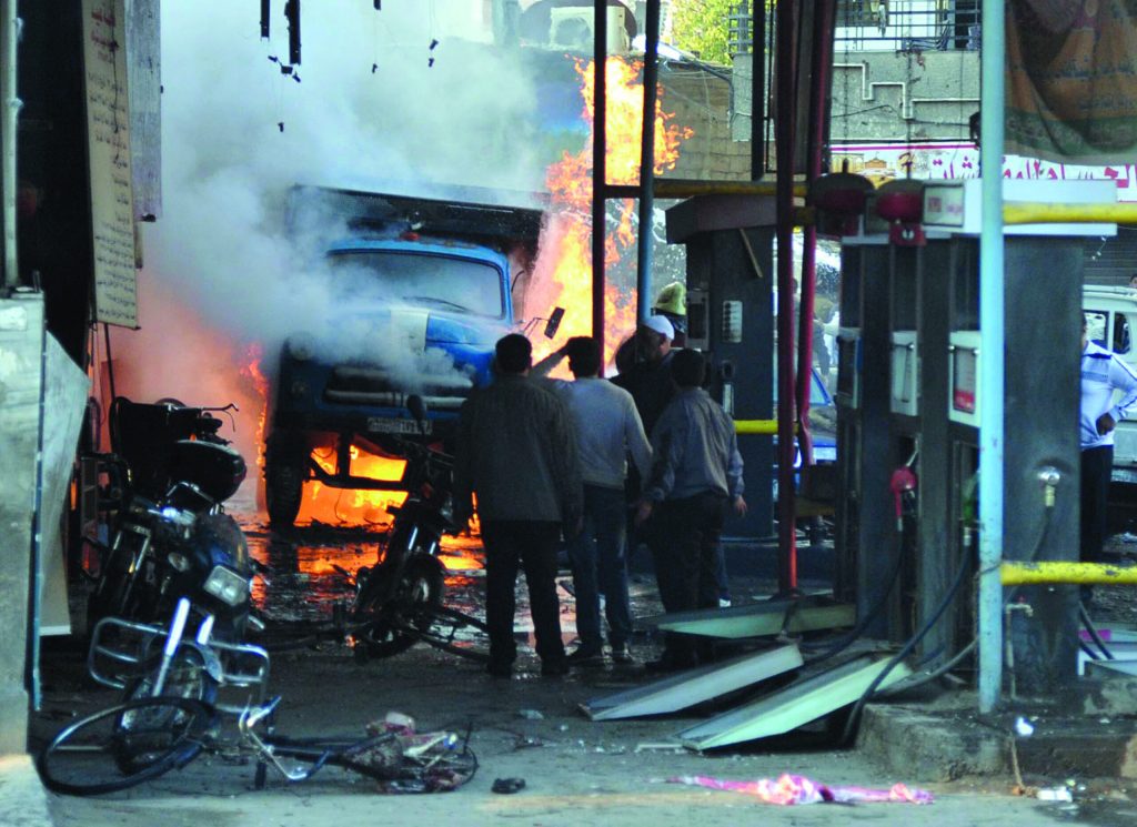 Twin car bombs near Damascus kill 34