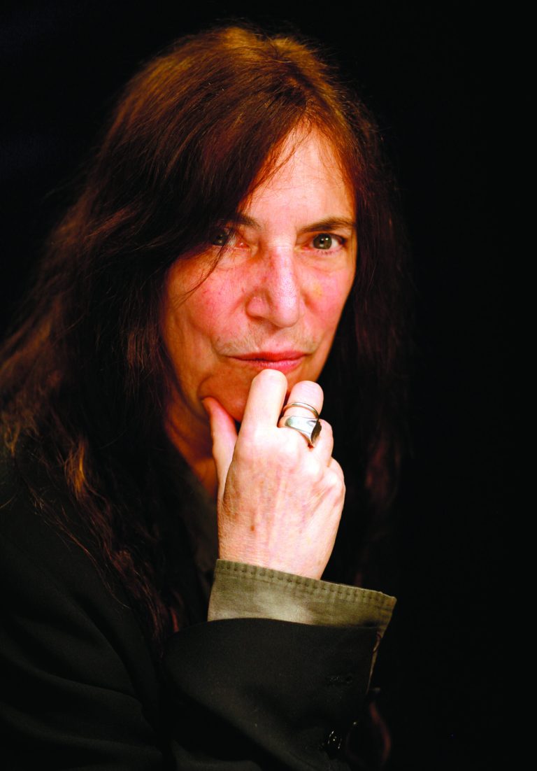FILE - This May 29, 2012 file photo shows rock musician and writer Patti Smith in New York. Smith is being honored by Bryn Mawr College with a medal named after the late actress Katharine Hepburn. Smith accepted the 2013 Katharine Hepburn Medal on Thursday night, Feb. 7, 2013 in a ceremony at the college in suburban Philadelphia. (AP Photo/John Carucci, File)