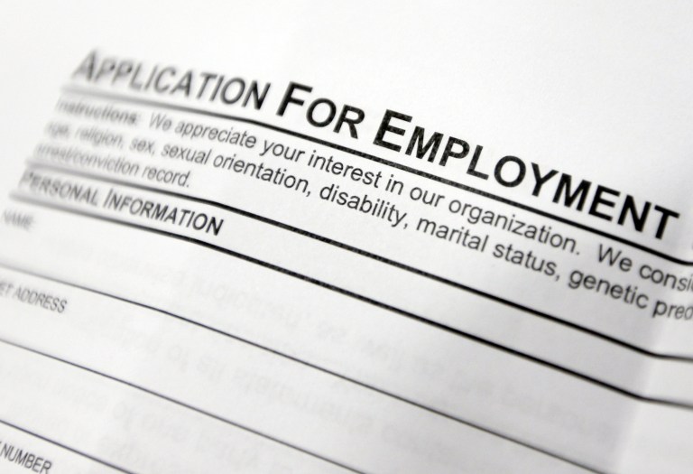 FILE - This April 22, 2014, file photo shows an employment application form on a table during a job fair at Columbia-Greene Community College in Hudson, N.Y. Payroll processor ADP on Thursday, Sept. 4, 2014 said that private employers added 204,000 jobs in August, down from 212,000 in July, which was revised slightly lower. (AP Photo/Mike Groll, File)