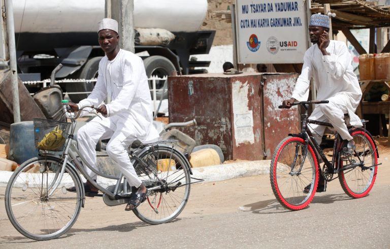 Muslim men ride on bicycles on a street in Kano, Nigeria, Sunday, March. 10, 2013. The United Kingdom's military says its warplanes recently spotted in Nigeria's capital city were there to move soldiers to aid the French intervention in Mali, not to rescue kidnapped foreign hostages. The Ministry of Defense said Sunday that the planes had ferried Nigerian troops and equipment to Bamako, Mali. An Islamic extremist group in Nigeria called Ansaru partially blamed the presence of those planes as an excuse for claiming Saturday that it killed seven foreign hostages it had taken. ( AP Photo/Sunday Alamba)