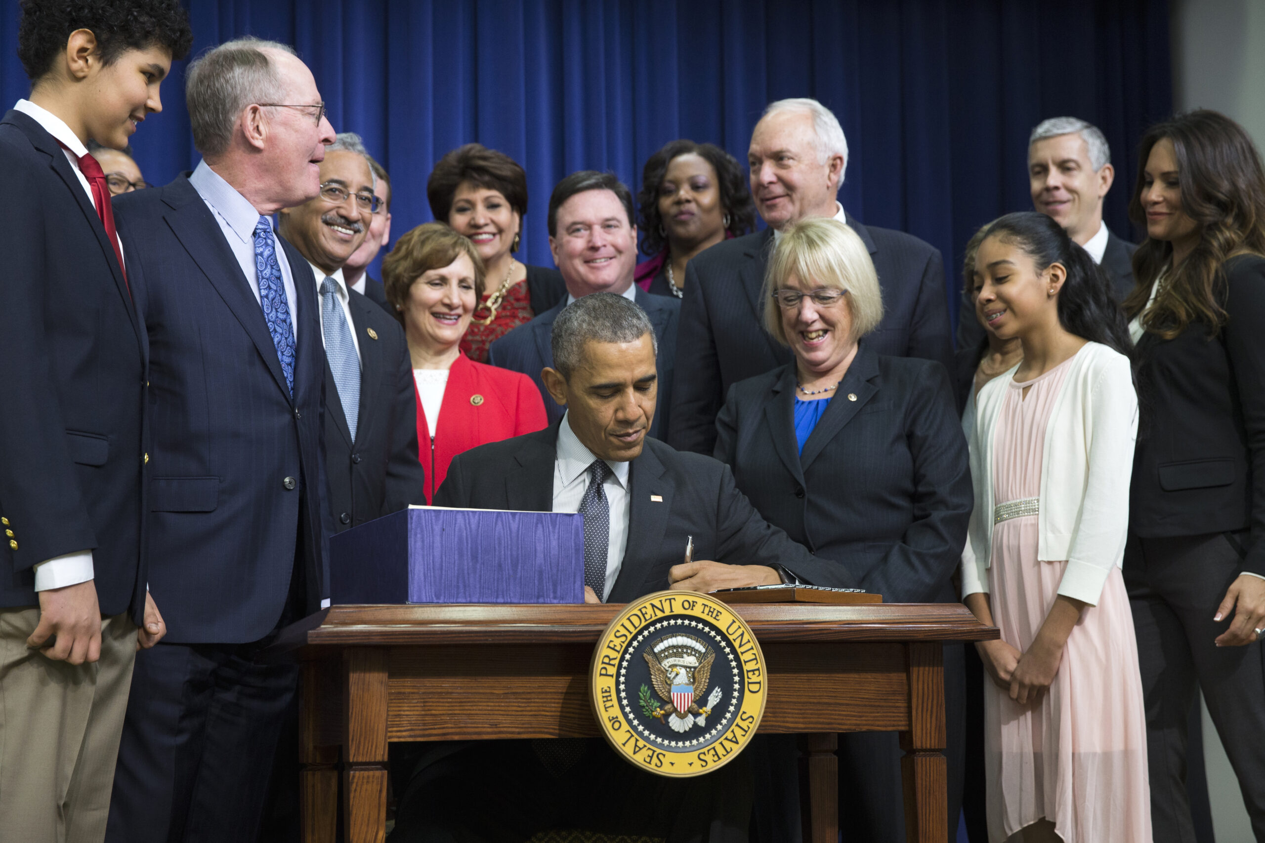 Obama hails education reform bill as ‘Christmas miracle’