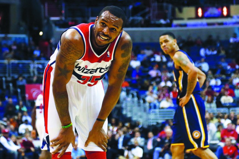 Rob Carr/Getty Images
Trevor Booker finished with four points and eight rebounds in 23 minutes as the Wizards fell to 0-9 this season.
