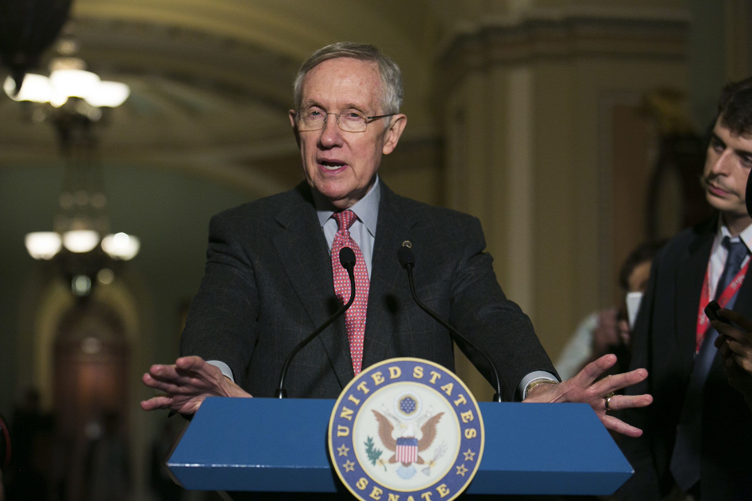 Reid urges Senate to pass spending bill, despite objections