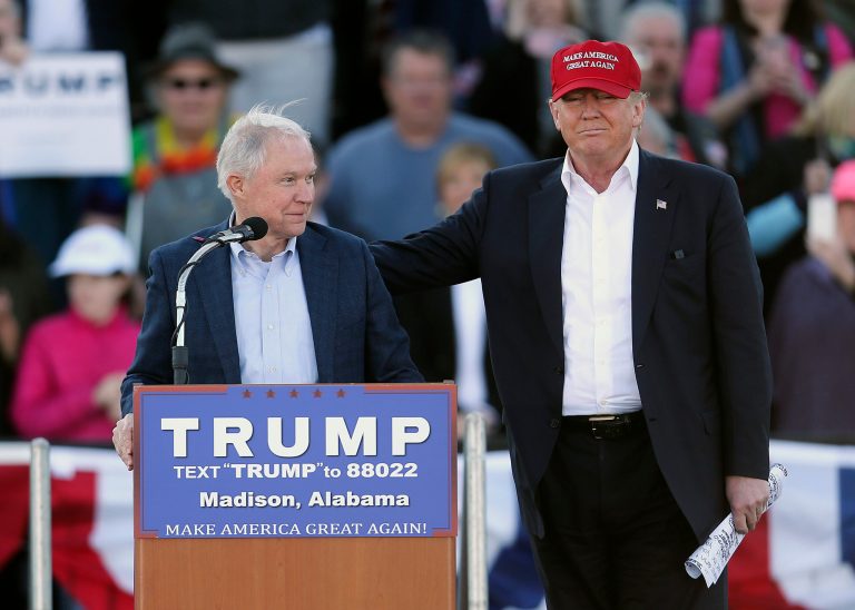 Republican presidential candidate Donald Trump, right, stands next to Sen. Jeff Sessions, R-Ala., as Sessions speaks during a rally in Madison, Ala. The conservative, confirmed Wednesday as Attorney General, is an anchor of the Trump cabinet. (AP Photo/John Bazemore)