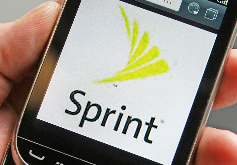 In this Monday, July 29, 2013, photo, a Sprint logo is displayed on a smart phone in Montpelier, Vt. In revamping its prices and plans this week, Sprint is joining Verizon and AT&T in letting families share pools of data. (AP Photo/Toby Talbot, File)