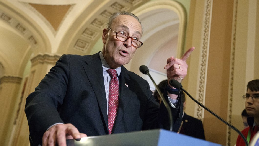 WATCH: Chuck Schumer snaps at Republicans talking during 11th-hour tax reform speech