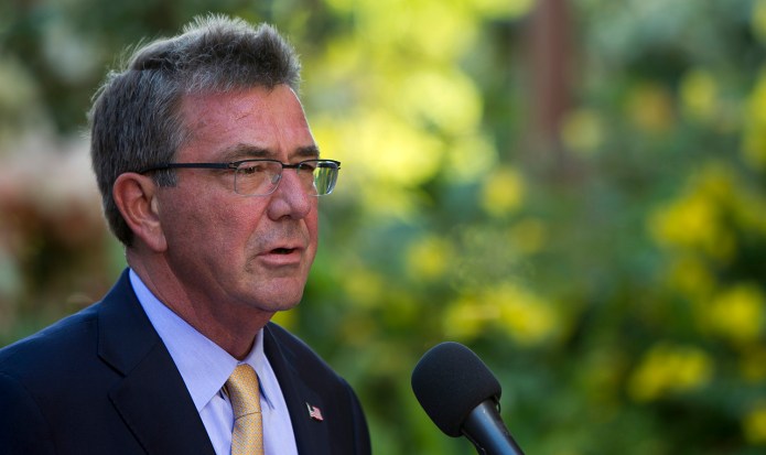 "I don't think it should be a military or purely military response," Carter said. (AP Photo/Marco Garcia)