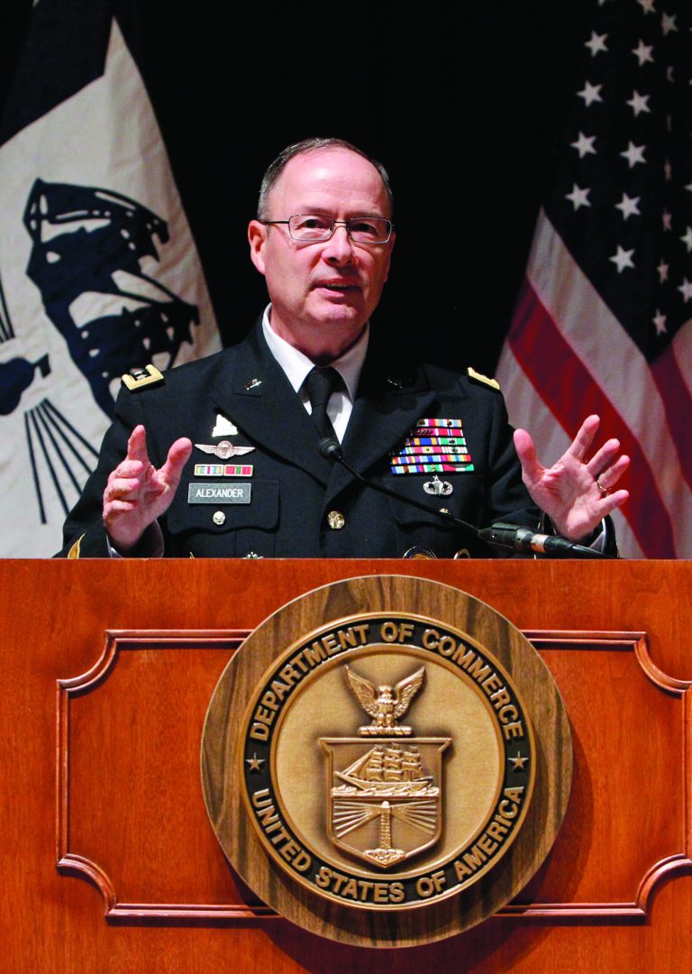 U.S. Cyber Command Commander, National Security Agency Director and Central Security Service Chief General Keith Alexander gestures during a news conference in Washington, Wednesday, Feb. 13, 2013, to give an update on President Barack Obama's Cybersecurity policy. Warning that American companies are the target of an intensive cyber-espionage campaign, President Barack Obama's top security officials on Wednesday said they are struggling to defend the nation from attacks on its private computer networks and called on Congress to pass legislation that would close regulatory gaps. (AP Photo/Ann Heisenfelt)