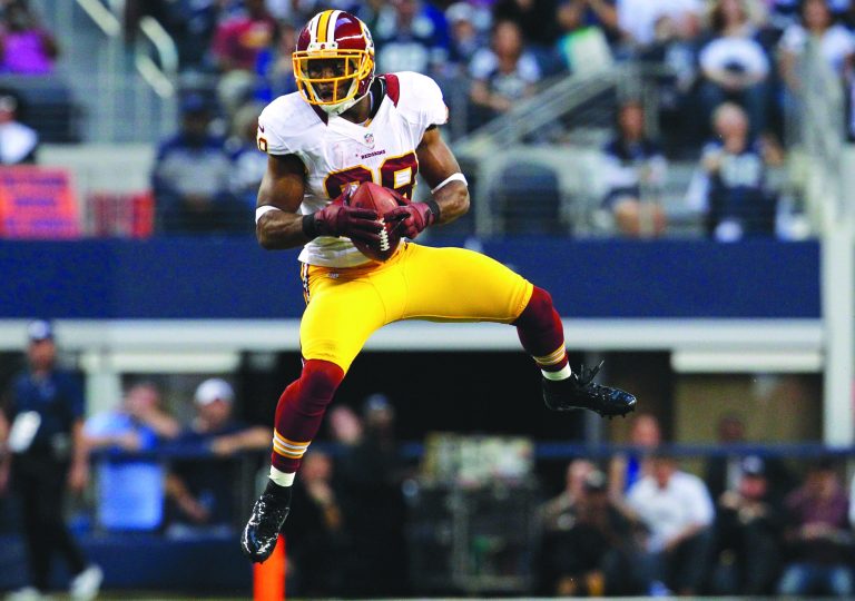 Tom Pennington/Getty Images
Wide receiver Pierre Garcon scored on a 59-yard catch and run from Robert Griffin III in the Redskins' victory over the Cowboys on Thanksgiving.