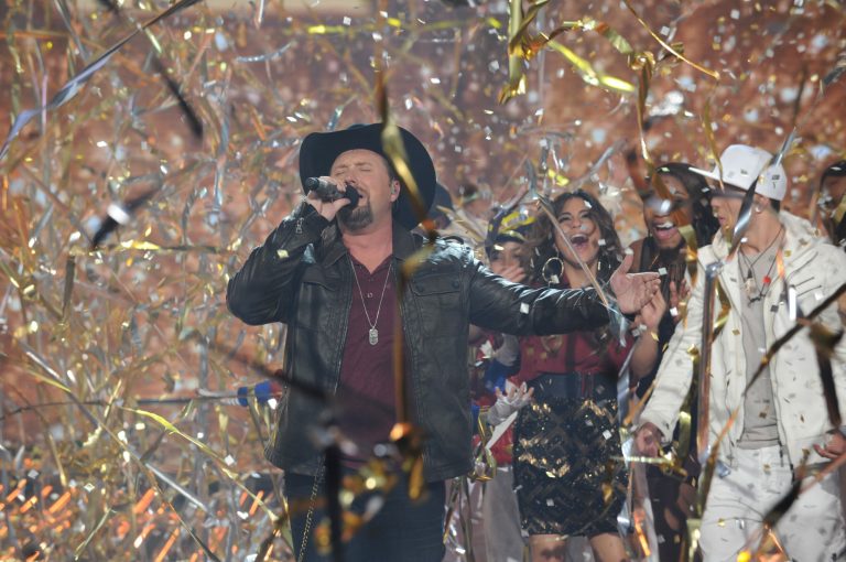   In this Thursday, Dec. 20, 2012 publicity photo released by FOX X FACTOR season two winner Tate Stevens performs during THE X FACTOR Finale Thursday night Dec. 22, 2012 on FOX. (AP Photo/FOX, Ray Mickshaw)  