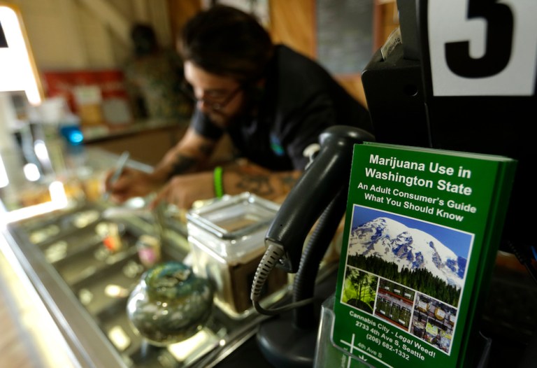 Federal law makes banking a headache for businesses selling marijuana. (AP Photo/Ted S. Warren)