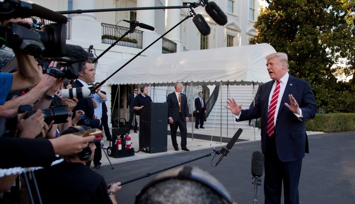 The media perpetually whine about President Trump threatening their freedom to tell the truth and then lie about his "bullying," "racism," and everything else he says in public. (AP Photo/Manuel Balce Ceneta)