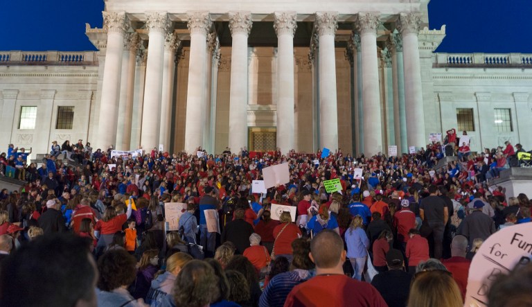 School personnel have protested outside of the West Virginia capitol for more than a week demanding better pay. (Craig Hudson/Charleston Gazette-Mail via AP)