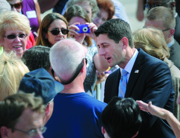 Republican vice-presidential candidate Paul Ryan greets people at Lakeland Linder Regional Airport in Lakeland , Fla. on Friday September 21, 2012. (AP Photo/The Lakeland Ledger, Scott Wheeler) TAMPA TRIBUNE OUT