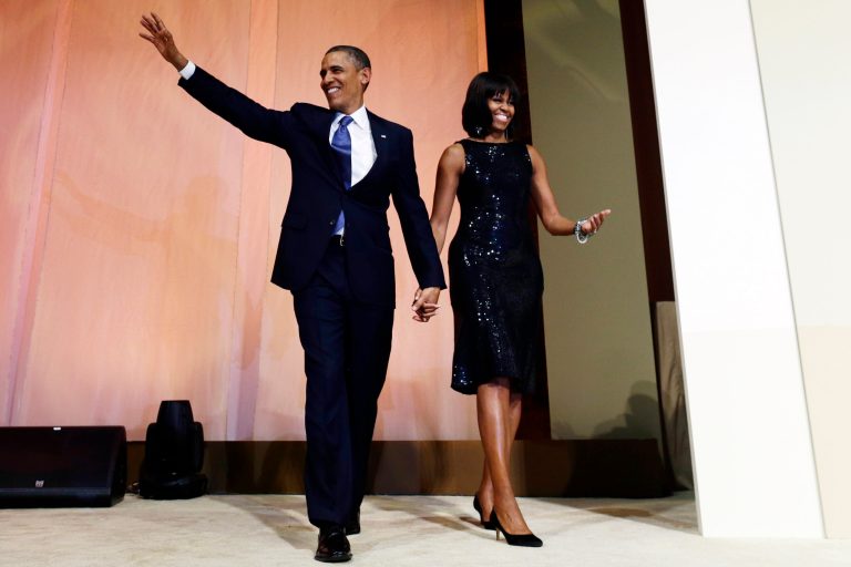 President Barack Obama and first lady Michelle Obama arrive to speak to supporters and donors at an inaugural reception for the 57th Presidential Inauguration at The National Building Museum in Washington, Sunday, Jan. 20, 2013. (AP Photo/Charles Dharapak)