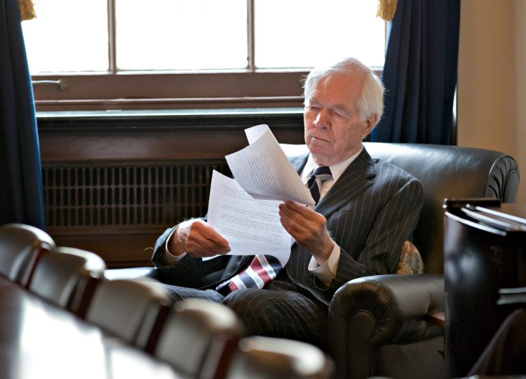 Sen. Thad Cochran, R-Miss., ranking member on the Senate Agriculture Committee, looks over documents before a closed-door meeting with other Farm Bill negotiators on Capitol Hill in Washington, Wednesday, Dec. 4, 2013. (AP Photo/J. Scott Applewhite)