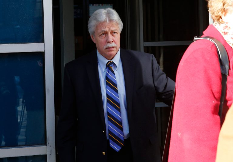 FILE - In this Jan. 18, 2013 file photo, Mark Strong Sr., leaves the Cumberland County Court House in Portland, Maine. The jury in Strong's trial watched a video Thursday, Feb. 28, 2013, showing a sexual encounter between Zumba fitness instructor Alexis Wright and a man who left cash on her massage table. Strong is charged with 13 counts that relate to promoting prostitution. He contends he had an affair with Wright and helped her launch her Pura Vida dance studio in Kennebunk, Maine, but his lawyer has said he was unaware of any paid sex. (AP Photo/Robert F. Bukaty, File)