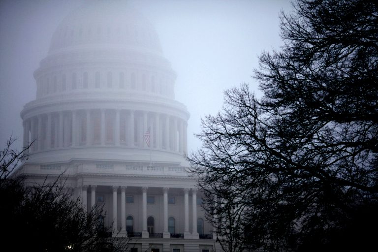   FILE - In this Dec. 10, 2012 file photo, fog obscures the Capitol dome on Capitol Hill in Washington. Big tax increases will hit millions of families and businesses a lot sooner than many realize if Congress and the White House don't agree on a plan to avoid the year-end fiscal cliff of automatic tax increases and government spending cuts. In fact, they already have. More than 70 tax breaks enjoyed by individuals and businesses already expired at the beginning of this year. If Congress doesn't extend them, a typical middle class family could get a $4,000 tax hike when they file their 2012 returns next spring, according to a private analysis. At the same time, businesses could lose dozens of tax breaks they have enjoyed for years. (AP Photo/J. Scott Applewhite)  
