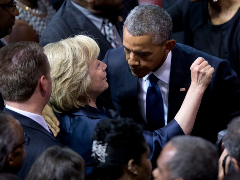 President Barack Obama embraces Hillary Rodham Clinton at the June 26, 2015 Emanuel AME Church in Charleston. (AP Photo/Carolyn Kaster)