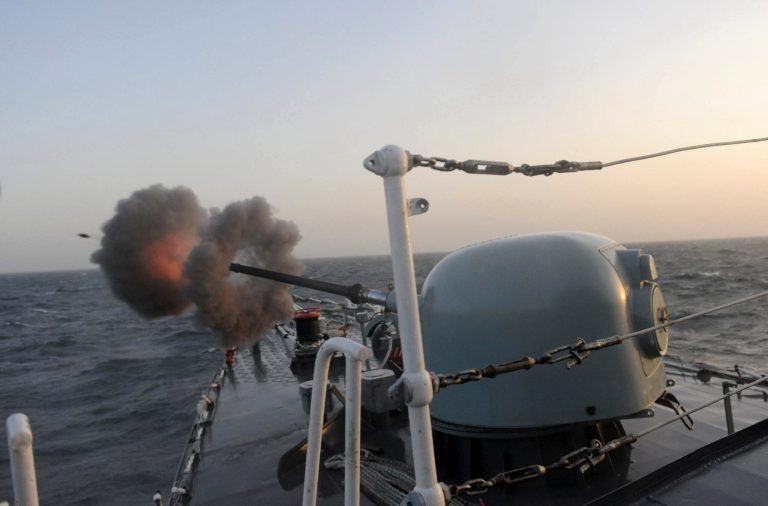 In this Feb. 21, 2010 file photo, an Iranian guided-missile destroyer fires during an exercise in the Persian Gulf, off the coast of Iran. (AP Photo/IIPA, Ebrahim Norouzi, File)