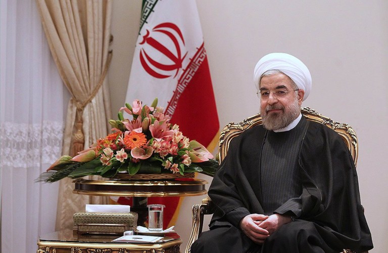 In this photo released by the official website of the office of the Iranian Presidency, President Hassan Rouhani sits in a meeting with Swedish Foreign Minister Carl Bildt at the Presidency compound in Tehran, Iran, Tuesday, Feb. 4, 2014. Iran's official IRNA news agency quoted President Hassan Rouhani as saying his country is ready for final nuclear talks with world powers. The Tuesday remarks came during a meeting with visiting Swedish Minister for Foreign Affairs Carl Bildt. (AP Photo/Presidency Office, Mohammad Berno)