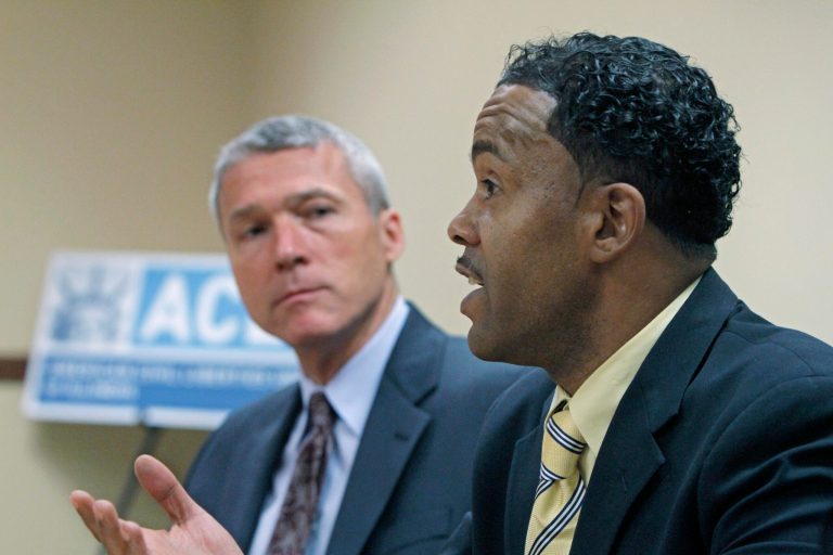   FILE - This Wednesday, June 22, 2011 file photo shows Chicago resident Arick Buckles, right, who is HIV positive, with ACLU attorney John Knight. Buckles filed a federal lawsuit Monday, June 18, 2012 claiming he was denied his prescribed medication for HIV for a week when he was an inmate in the Bureau County Jail in Princeton, Ill., in 2010, harming his health and violating his constitutional rights. The county was more worried about the cost of providing Buckles' HIV drugs than about his health, said American Civil Liberties Union attorney John Knight, who is helping represent Buckles. The drugs, a three-pill combination, cost more than $2,000 a month, according to Buckles' jail medical notes released to him by the county and shared by him with The Associated Press. (AP Photo/M. Spencer Green, File)  