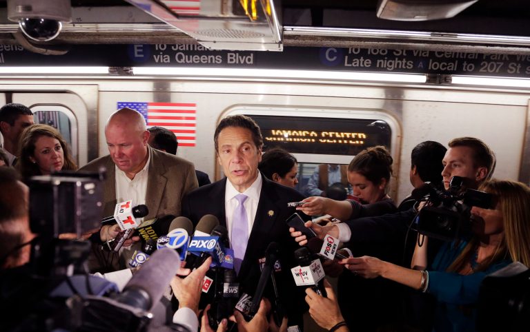 New York Governor Andrew Cuomo holds a news conference on a subway platform, Thursday, Sept. 25, 2014 in New York. The governor says New York is acting with 