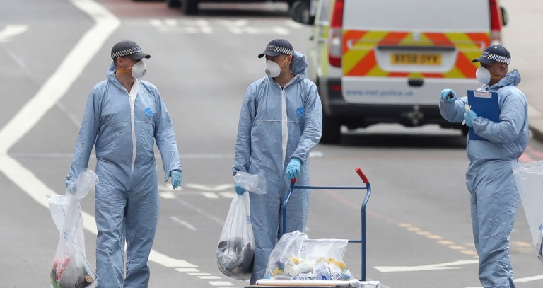 Police forensic officers on London Bridge on Sunday, following the previous night's terrorist incident. (Andrew Matthews/PA via AP)