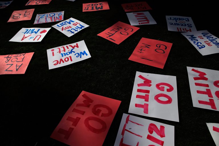 MESA, AZ - FEBRUARY 13:  Signs are seen before Republican presidential candidate, former Massachusetts Gov. Mitt Romney attends a Get out the Vote Rally February 13, 2012 in Mesa, Arizona. Romney spoke to a crowd of more than 2,000 people, and is the first contender to visit the state prior to the primary on February 22, 2012. (Photo by Eric Thayer/Getty Images)
