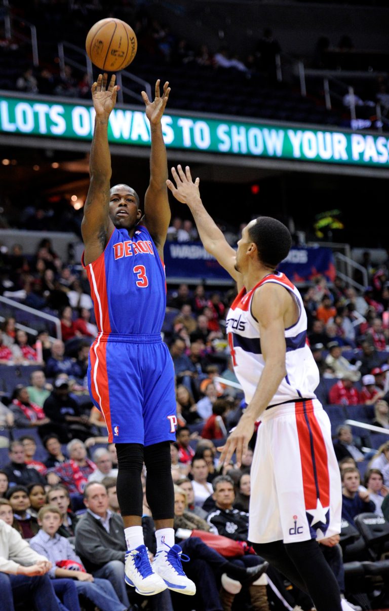   Detroit Pistons guard Rodney Stuckey takes a shot against Washington Wizards guard Shaun Livingston, right, during the first half of an NBA basketball game, Saturday, Dec. 22, 2012, in Washington. (AP Photo/Nick Wass)  