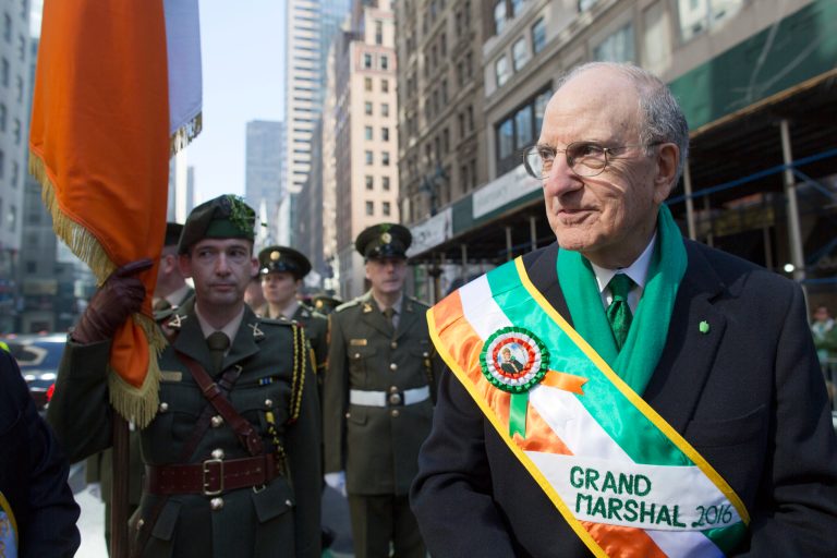 Members of the 28th Battalion Finner Camp of the Irish Army Reserve stand next to Former U.S. Sen. George Mitchell before the start of the St. Patrick's Day parade, Thursday, March 17, 2016, in New York. (AP Photo/Mary Altaffer)