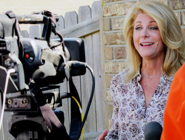 Texas Democratic gubernatorial nominee Wendy Davis is interviewed before a block-walking session on Oct. 25 in Killeen, Texas. (AP/Will Weissert)